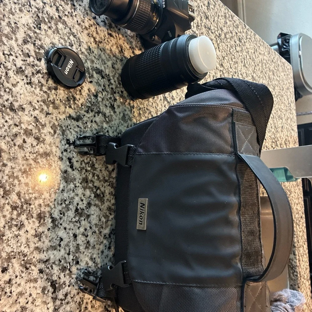 Nikon Black Digital Camera with Ergonomic Design and Professional Lens